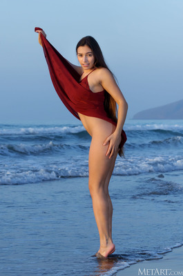 Shelena Drops A Sheer Wrap On A Rocky Coastline At Sunset - 04