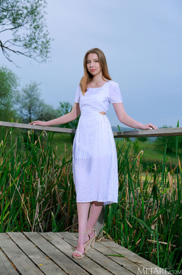 Estella Drops A White Sundress On A Lakeside Dock - 00