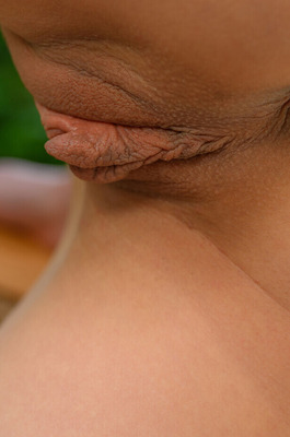 Val Eriia Goes Topless On The Patio Bench - 17