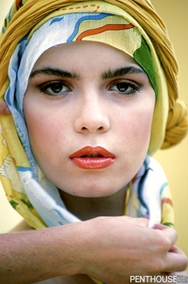 Christianna Goes From Big Hats And Headscarves To Bare In The Surf - 02