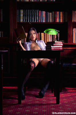 Apple Wang Goes Topless Between The Bookshelves And Bends Over A Leather Chair - 01